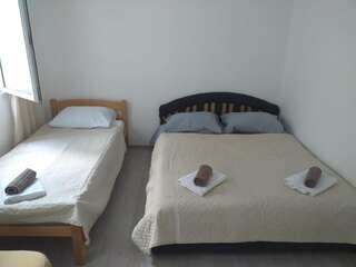 Гостевой дом Apartments Odal Сутоморе Классический четырехместный номер-19